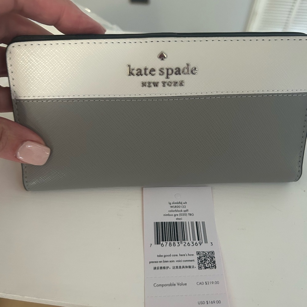 NWT KATE SPADE color blocked large wallet.